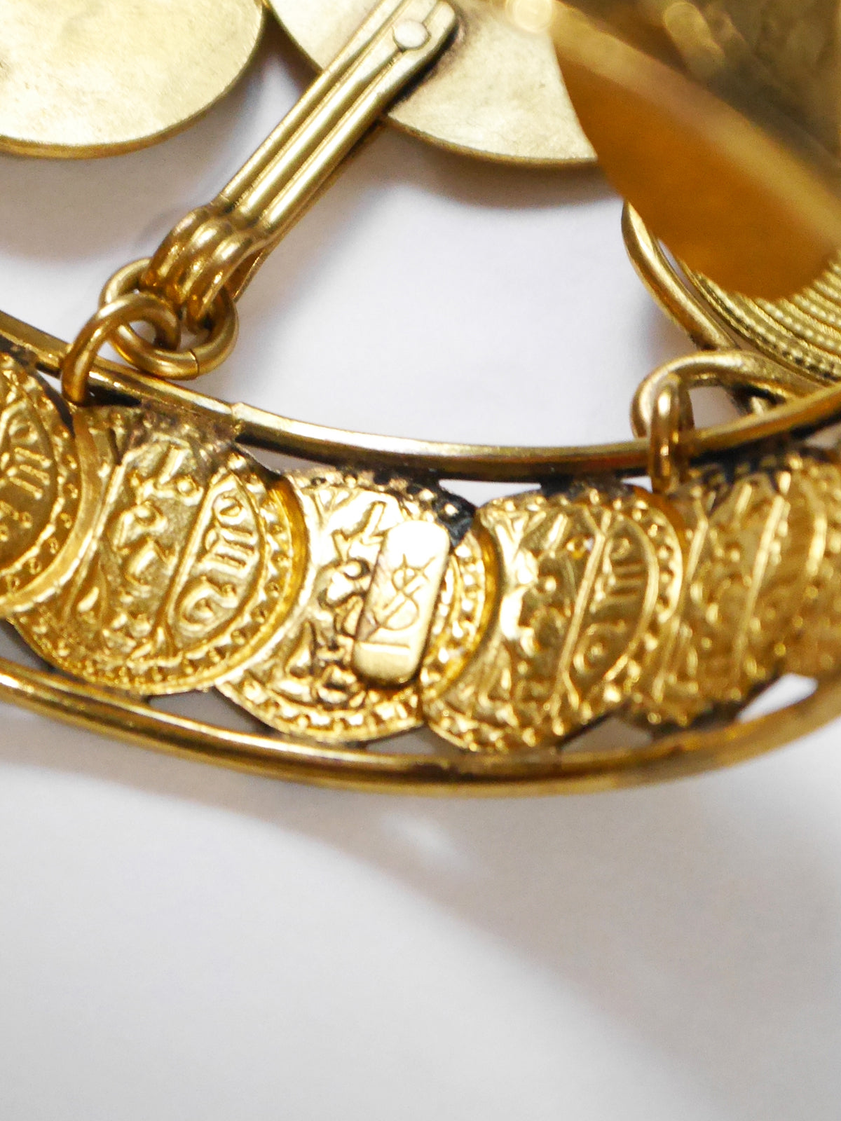 YVES SAINT LAURENT c. 1977 Vintage Coin Charm Pendant Bangle Bracelet