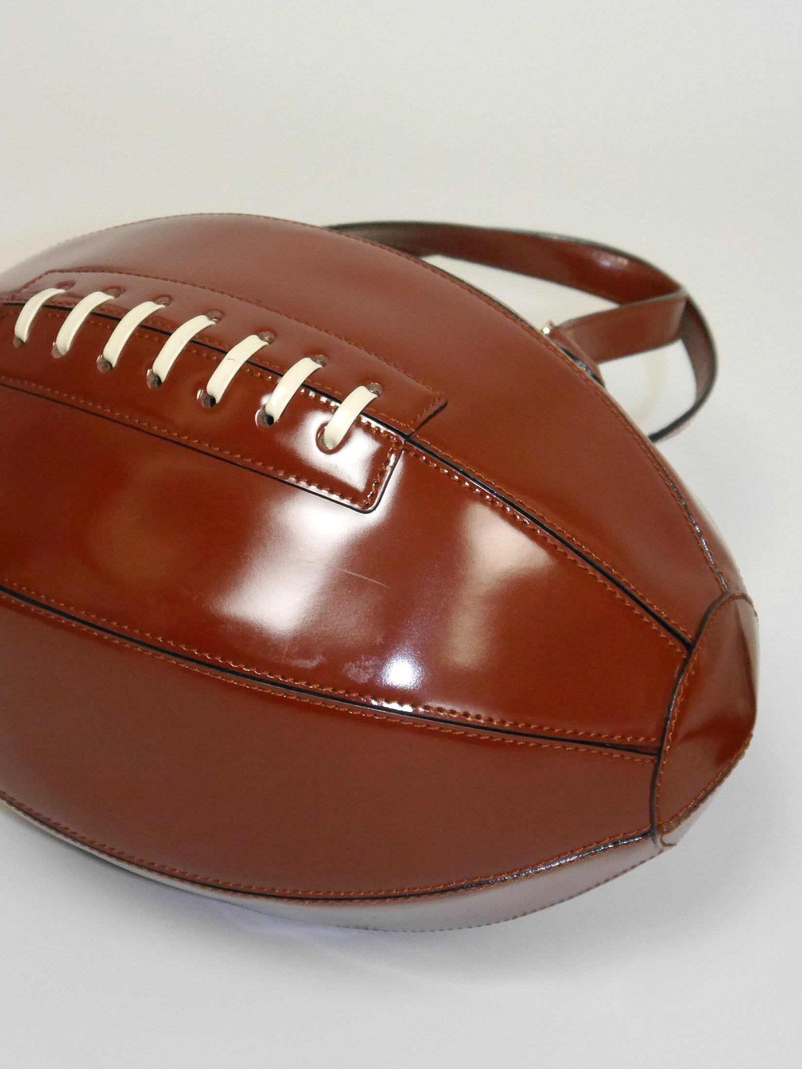 American football shaped purse top