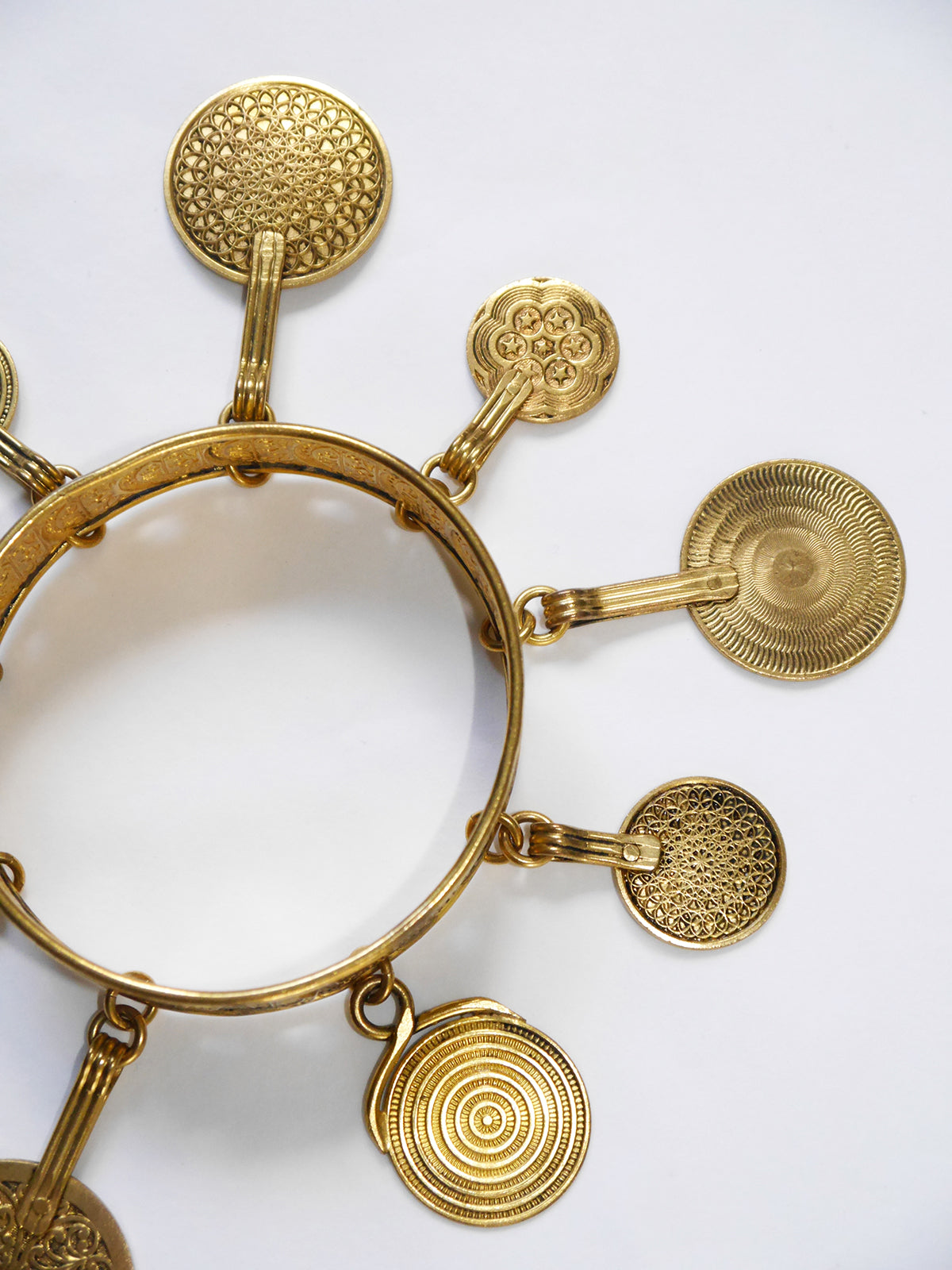 YVES SAINT LAURENT c. 1977 Vintage Coin Charm Pendant Bangle Bracelet